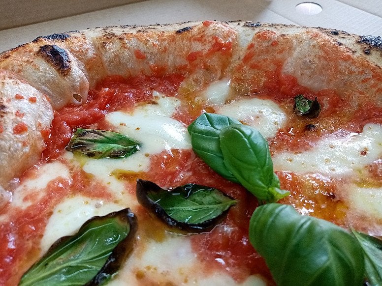 Win 2 ยฃ50 voucher for FREE pizza delivry