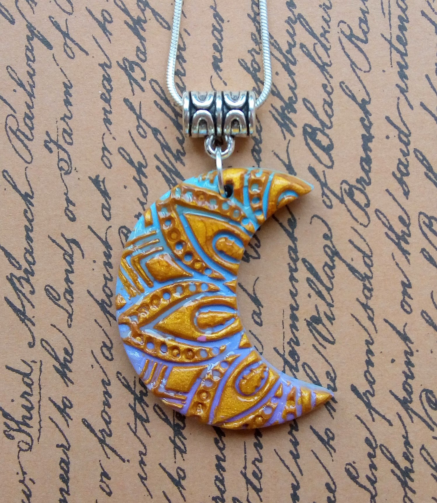 New shop listing.... Half moon pendant